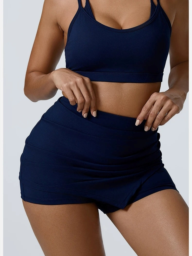 Jupe Short Fitness Femme, Bleu, vue de face avec la jupe moulante
