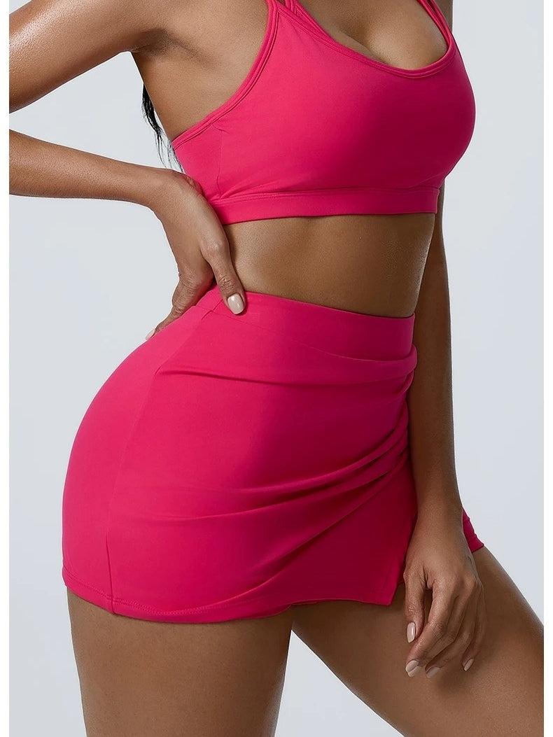 Jupe Short Fitness Femme, rose, vue de profil