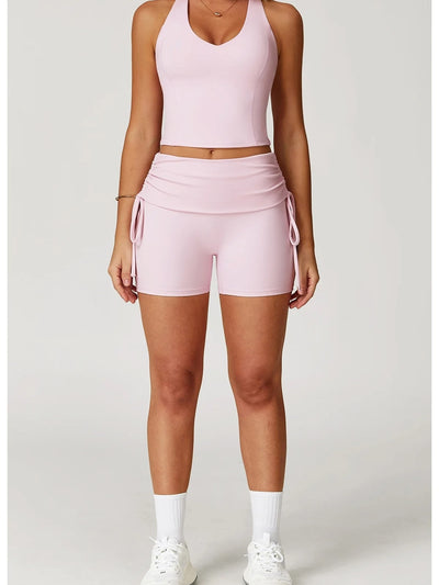 short fitness femme sculptant taille haute rose, vue de face en complet