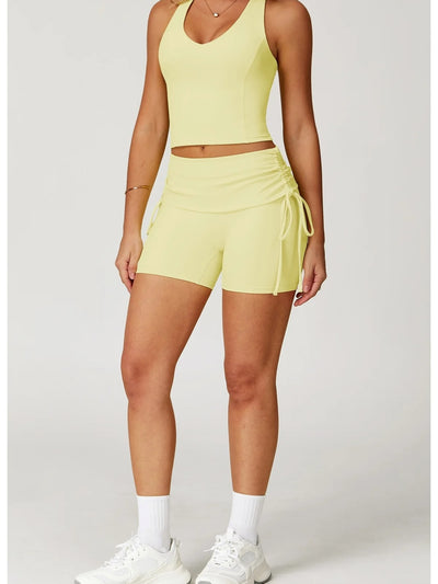 short fitness femme sculptant taille haute jaune, vue de face