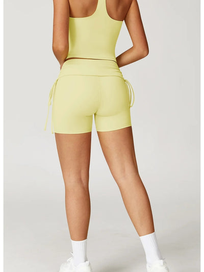 short fitness femme sculptant taille haute jaune, vue de dos